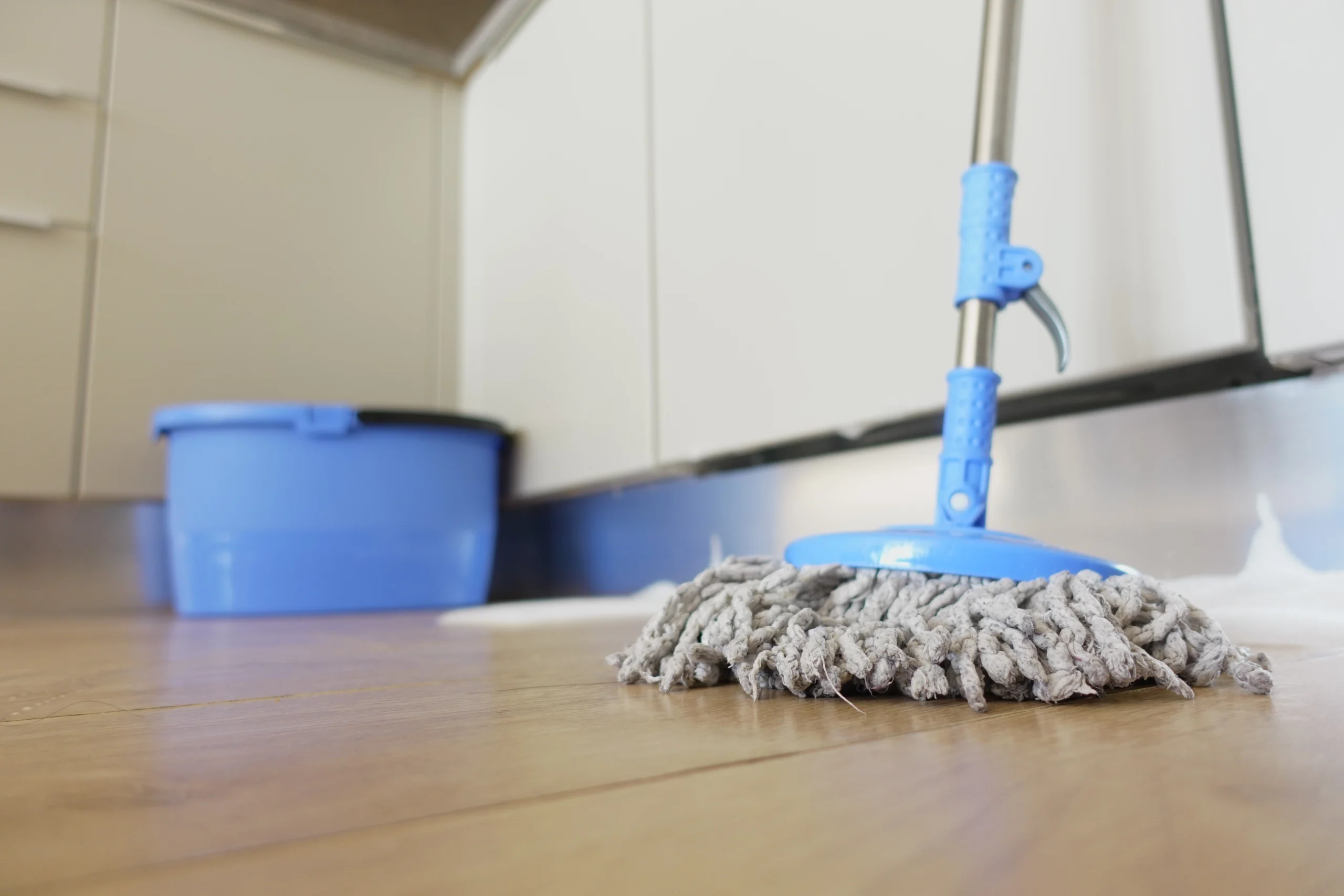 Best way to clean laminate flooring without damaging it using microfiber mop and gentle cleaning solution